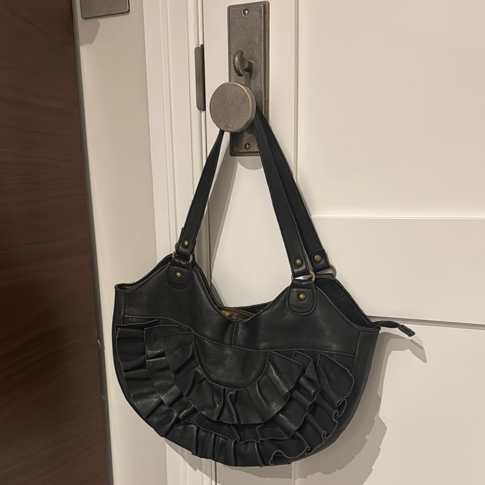 Grey Leather Crescent Shaped Hobo Bag with Ruched Design.